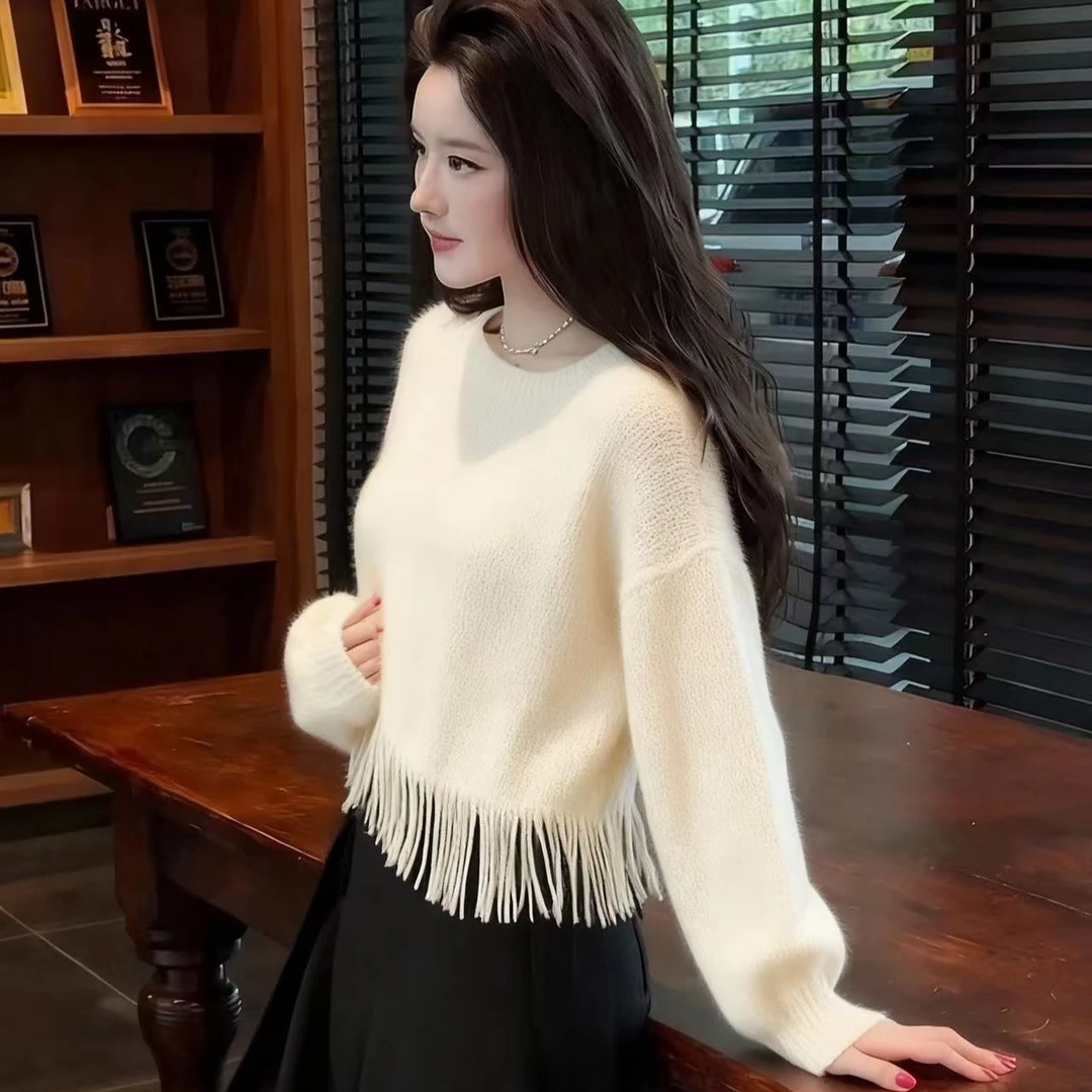 美拉德米白色秋冬慵懒感针织衫气质小众穿搭撞色条纹流苏毛衣上衣