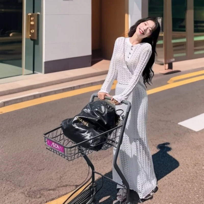 早秋新款法式高级感修身镂空圆领长袖上衣气质高腰显瘦半身裙套装