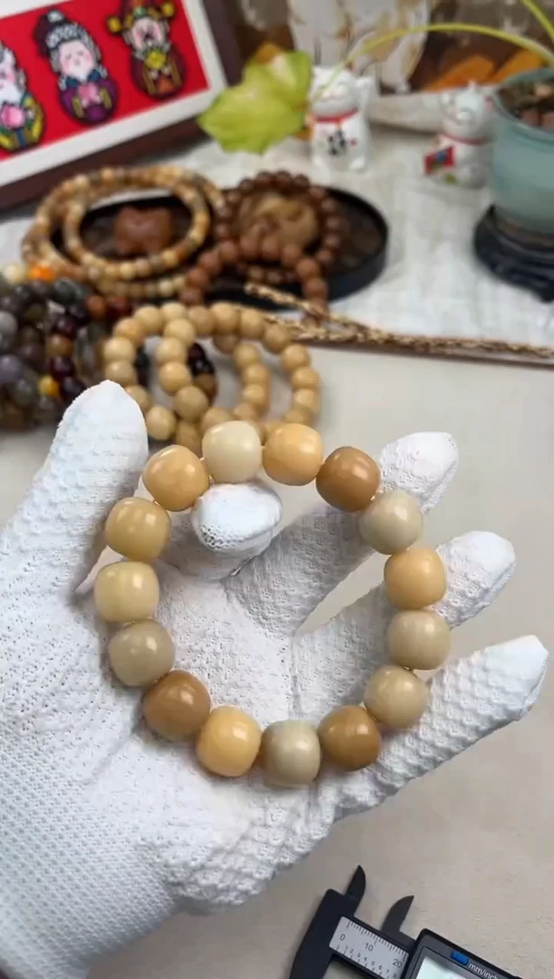 手串菩提根/象牙果a424 卡16.8 干磨奶咖老料瑕疵