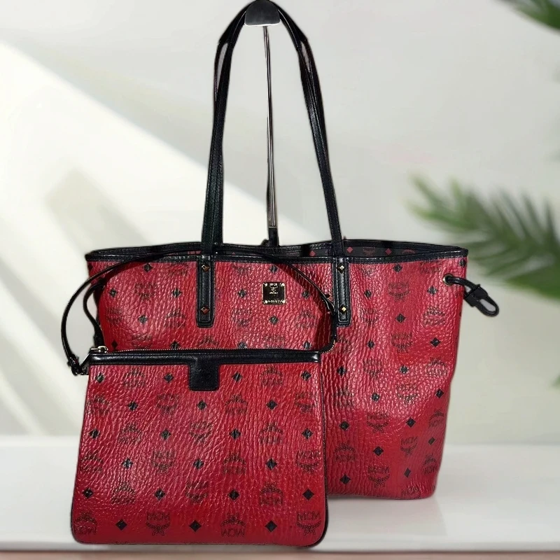 95新 MCM 火龙果色单肩包G25100420底长36*28