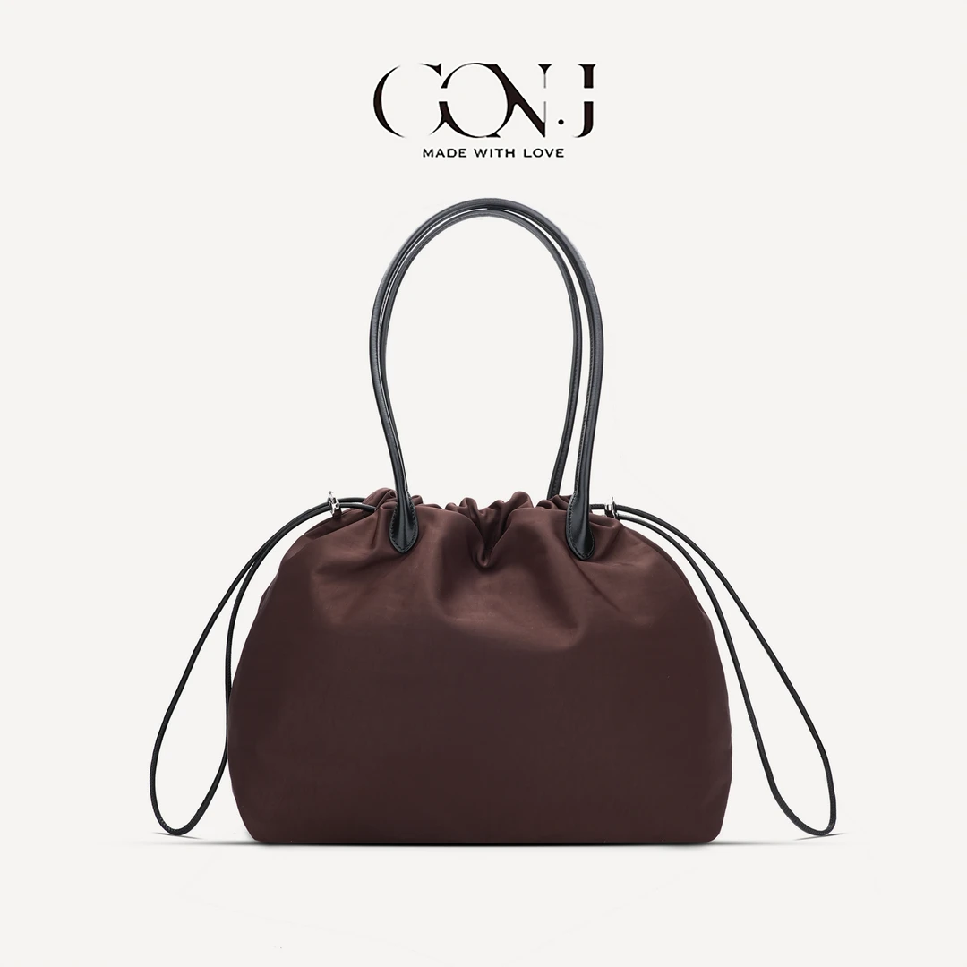 CON.J日韩系ins风尼龙布小众简约纯色休闲大容量抽绳单肩手提包