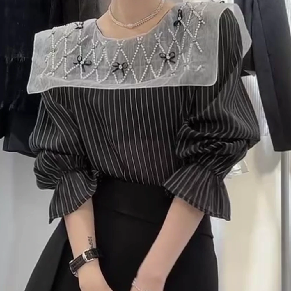 早春时尚设计感小众法式显瘦衬衫长袖百搭气质圆领洋气衬衣