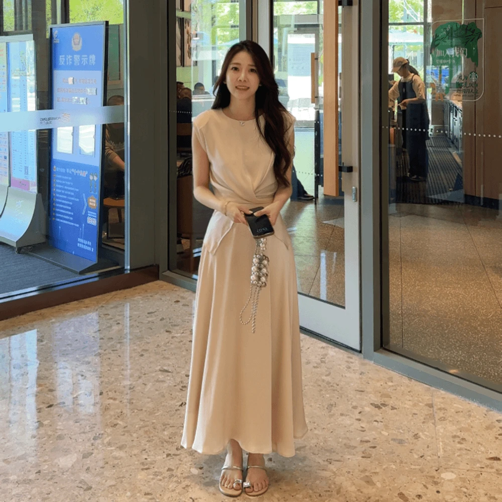 小众不规则交叉无袖背心高级缎面大摆半身裙2025夏新款时尚套装