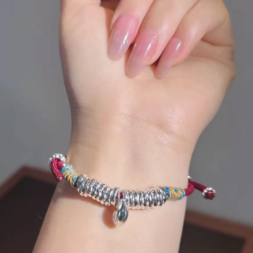 铜合金布艺手链 铜合金2026新款钱币福袋手链经典百搭设计款