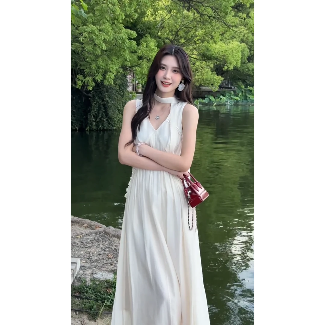 MARIE.COCO今年流行减龄法式初恋小众度假白色吊带连衣裙子女夏