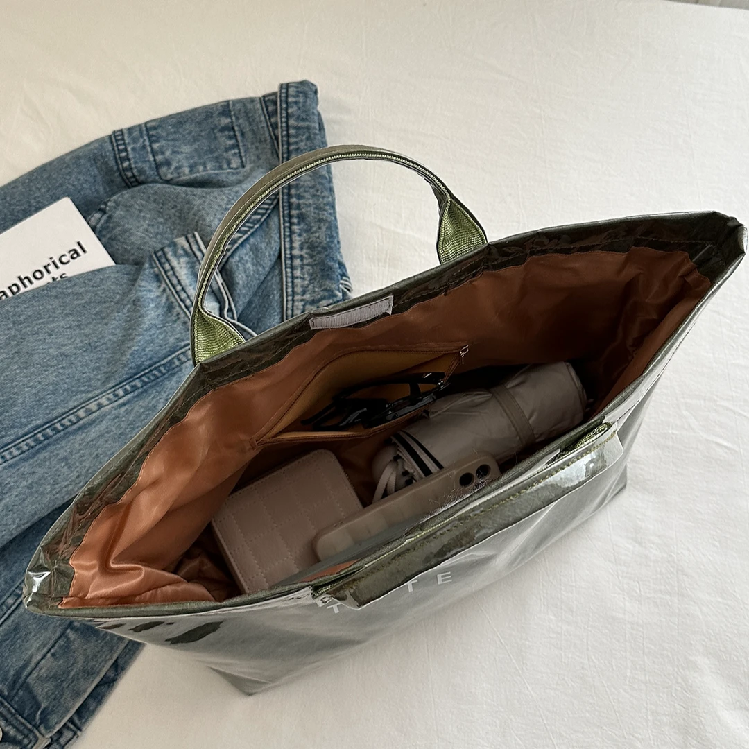 大容量手牛皮纸杜邦防水PVC透明时尚果冻上班高级手提包购物袋包