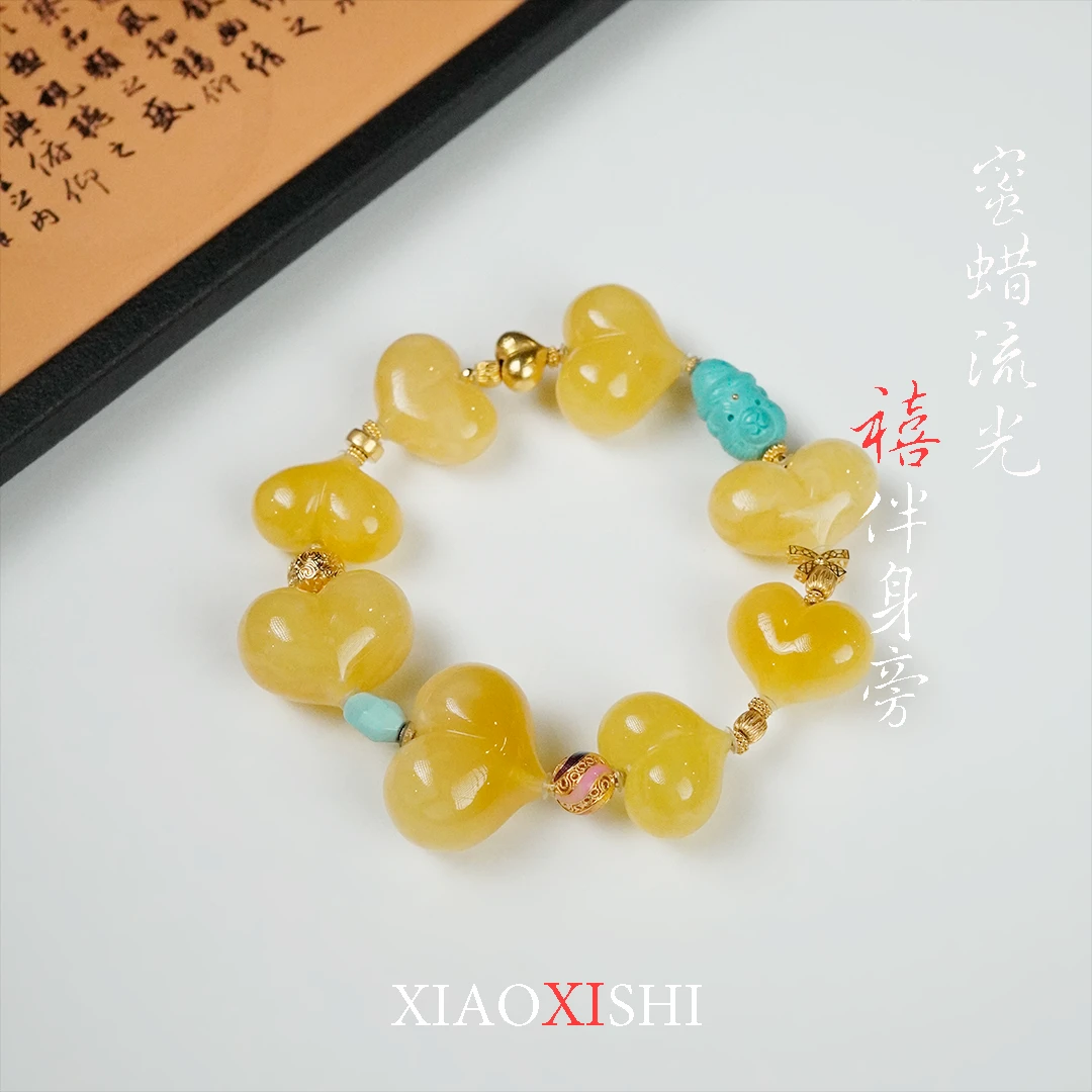 绿松石心形蜜蜡手串18k