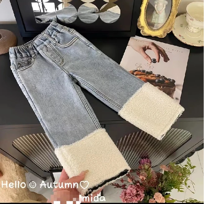 裤脚拼接毛毛一体绒高腰烟筒牛仔裤