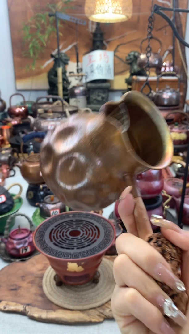 一*650cc 一张打手工锤纹陨石坑果木瘤侧把公杯 分茶器