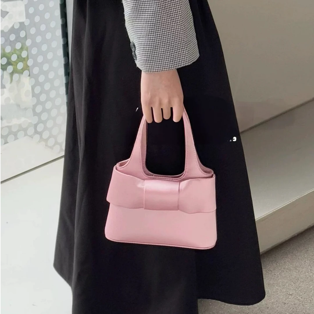 韩系缎面蝴蝶结手提包2025新款小众设计芭蕾粉色公主包单肩斜跨包