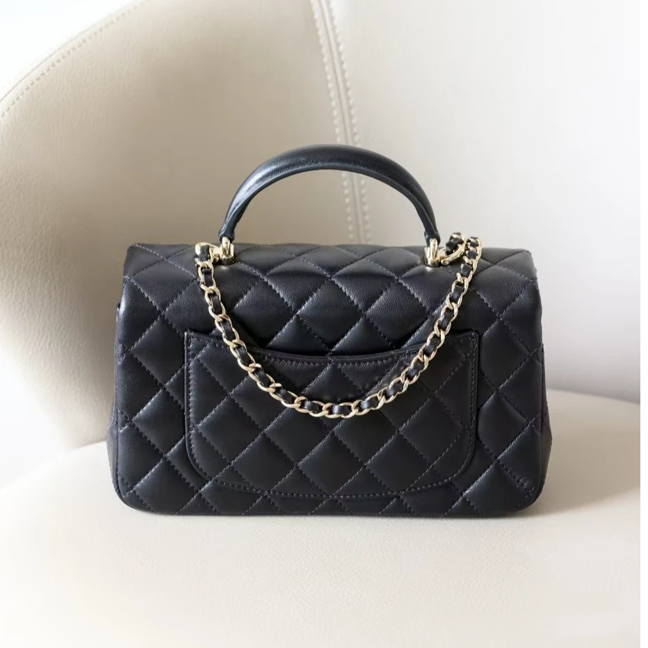 万颐cf手提 大mni 包 包 真皮手提包