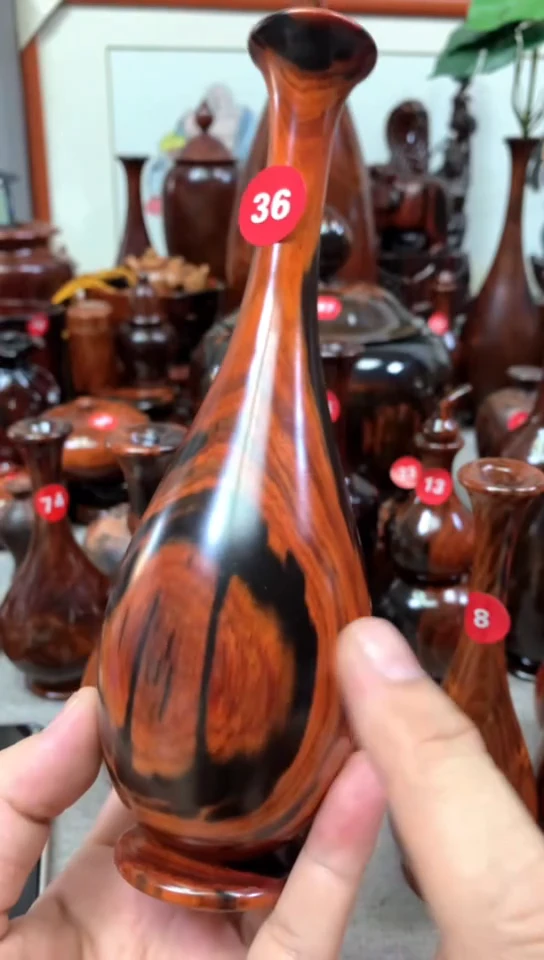 木一****凯大红酸枝花瓶一个