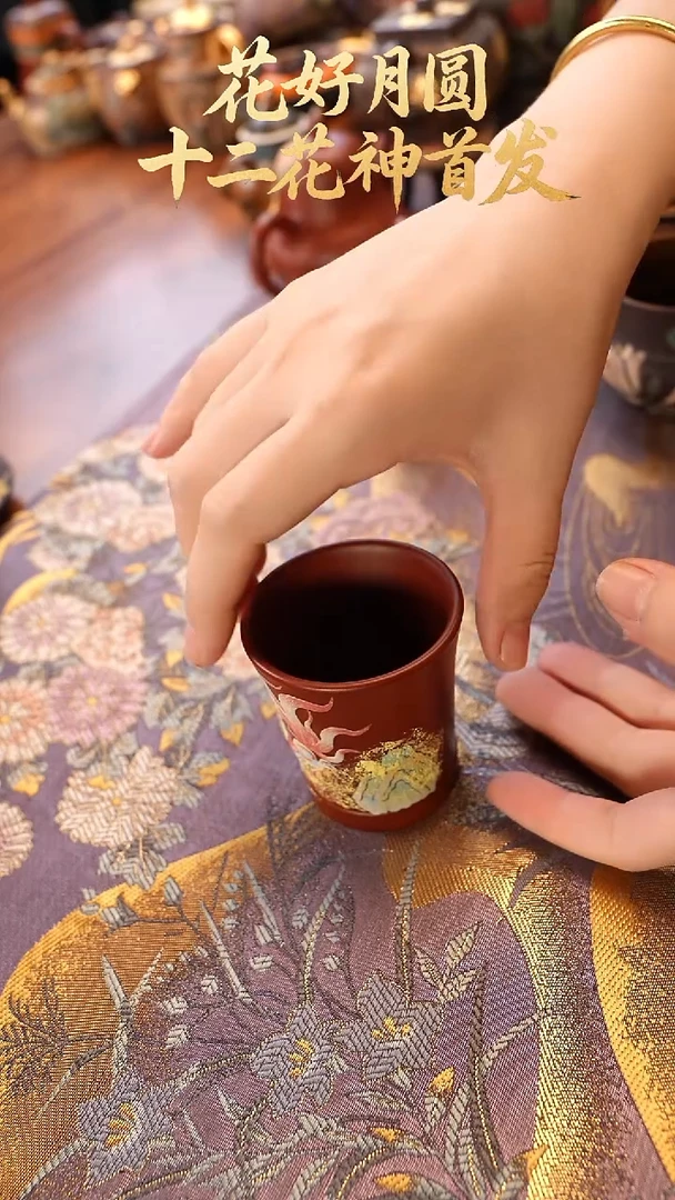 紫砂茶宠朱泥九尾壶杯子