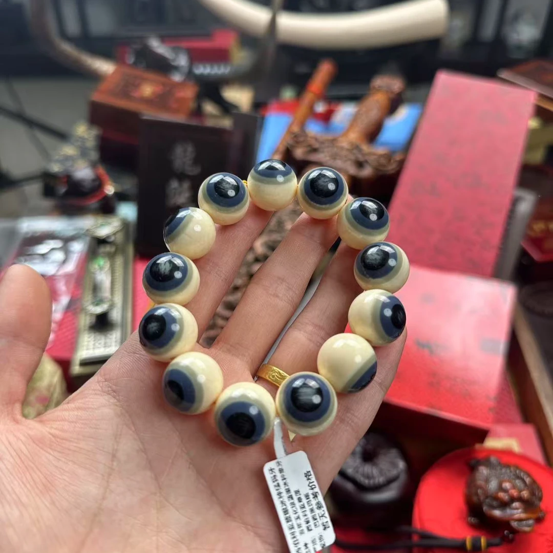【闪购商品】猛犸牙蓝眼手串圆