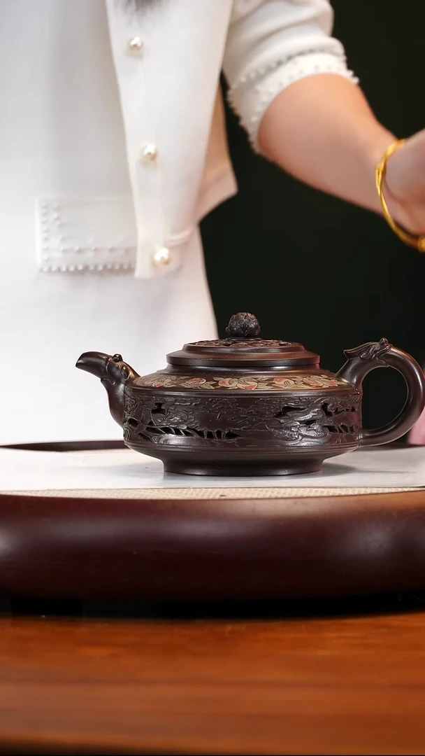 PHJ129乾清紫泥镂空周盘550cc