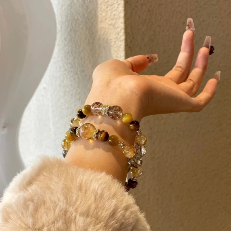 富贵水晶天然原创金虎眼黑金超黄塔晶黄水晶小众轻奢多样性发一