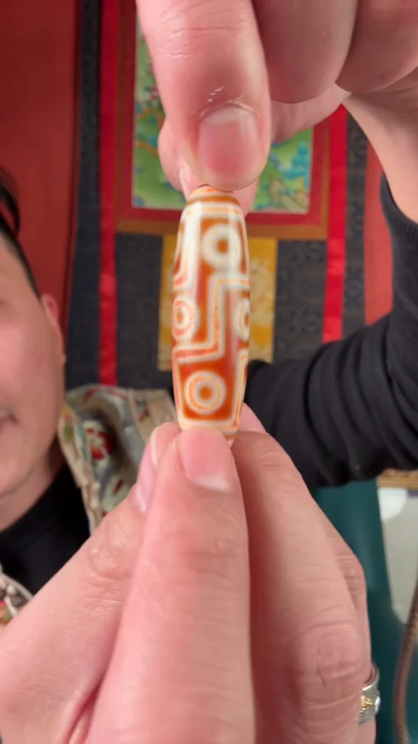 无非金属红肉九眼天珠