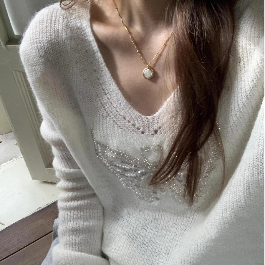 慵懒风白色镂空蝴蝶针织衫女装早春超好看v领毛衣套头上衣