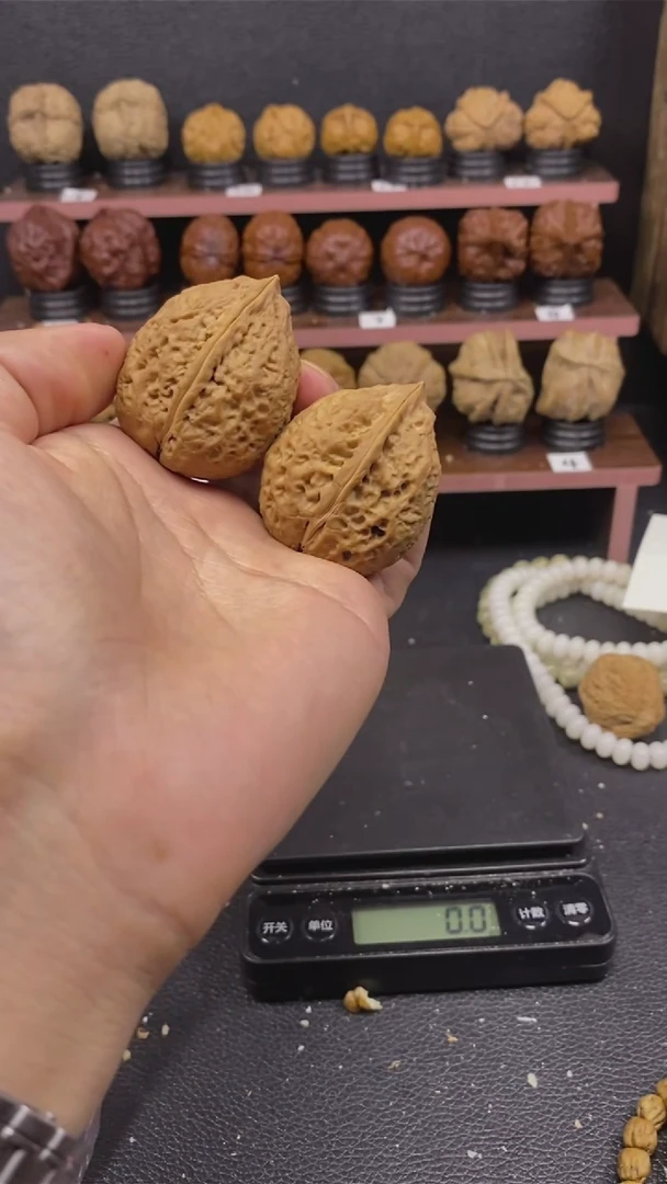 桃核把件云铁大沽石