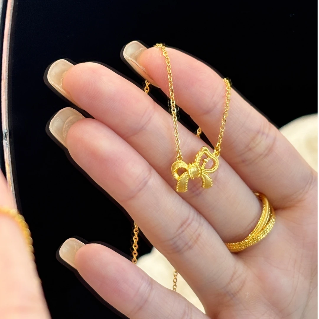 卡柒 铜合金项链 复古金色拉丝蝴蝶结项链女轻奢气质高级感锁骨链