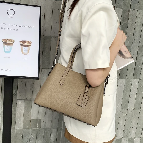 Jinho/金猴2025春季新款头层牛皮荔枝纹高级感通勤女包托特包