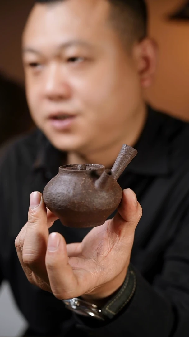 侧把壶