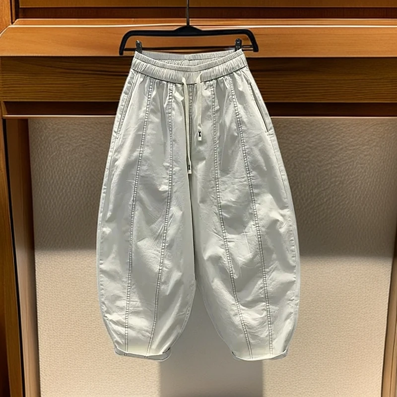 特大码300斤韩版松紧腰抽绳明线弯刀男士休闲裤宽松百搭哈伦裤子2