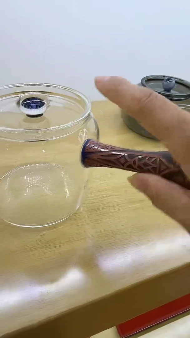 玉见墨岚侧把煮茶壶
