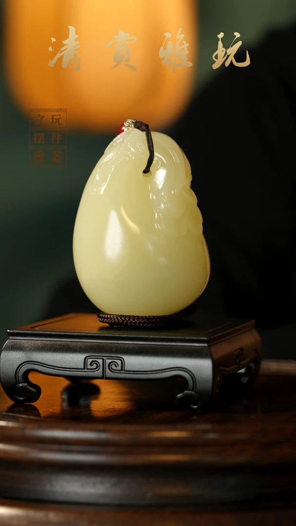 玉《钱袋子富得流油》手把件摆件