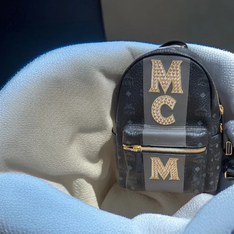 99新 MCM 黑色老花 金色柳钉双肩1180 2629