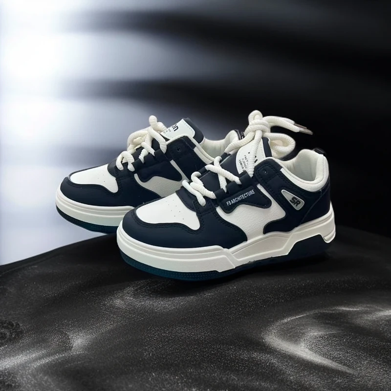 6607-1时尚百搭黑白拼接透气网孔板鞋