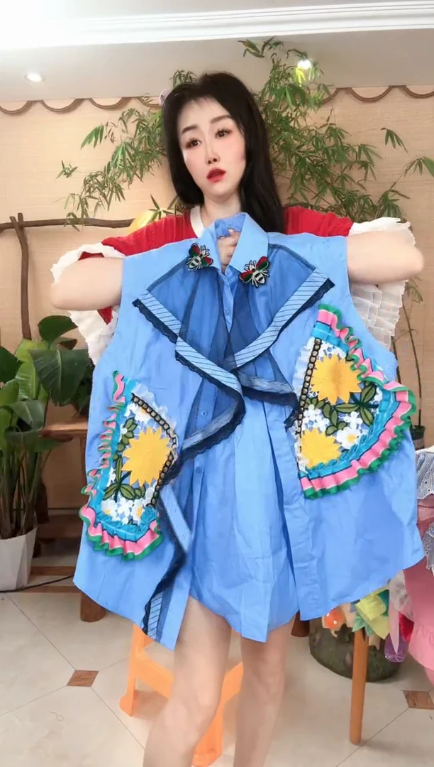 瑶****姐黄色花朵衬衫
