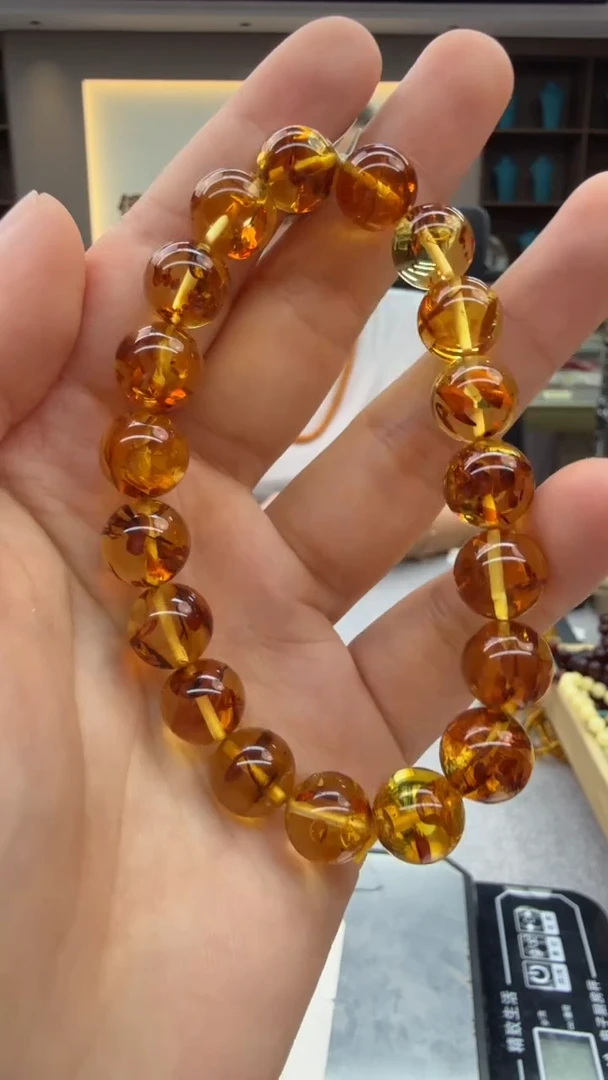 未镶嵌琥珀手链15秒拍号 假一罚三