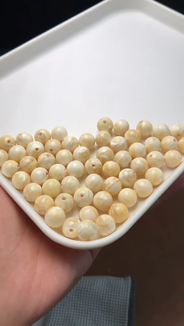 牛骨其他p1418 马牙原色 圆珠2个 有棕裂