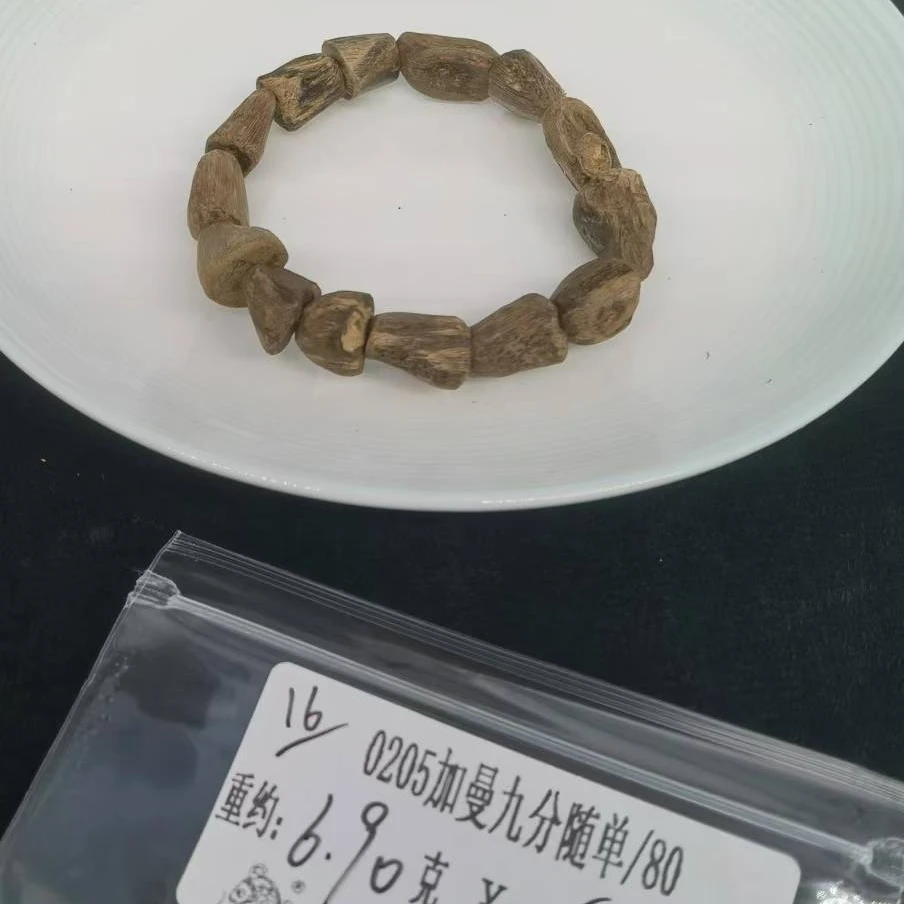 重约6.90克   0205加曼九分随单/80 （单） 天然木艺