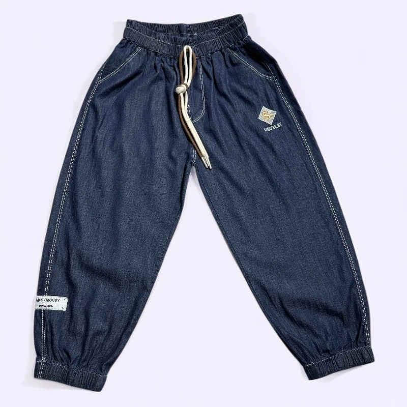 男童天丝牛仔裤秋季潮流宽松休闲裤薄款女童时尚百搭柔软洋气裤子