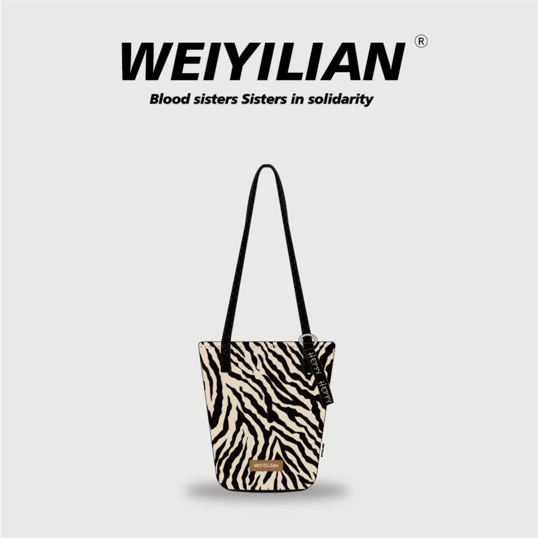 WEIYILIAN快乐斑马新款插画休闲时尚通勤斜跨加长水桶包WYL561-34