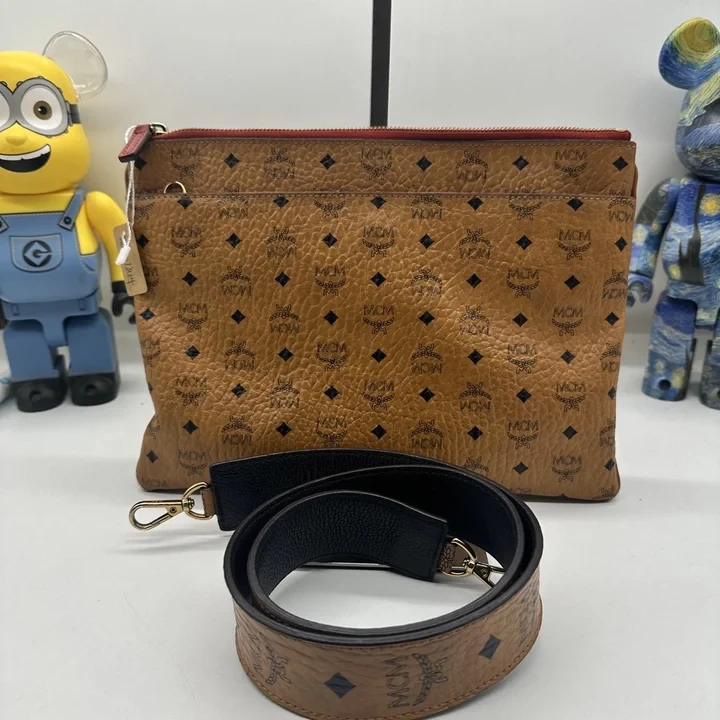 95新 MCM 手拿包/073124