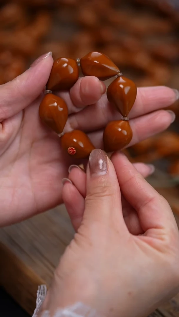 手串/手链橄榄核6籽带标手捻 （标色随机）