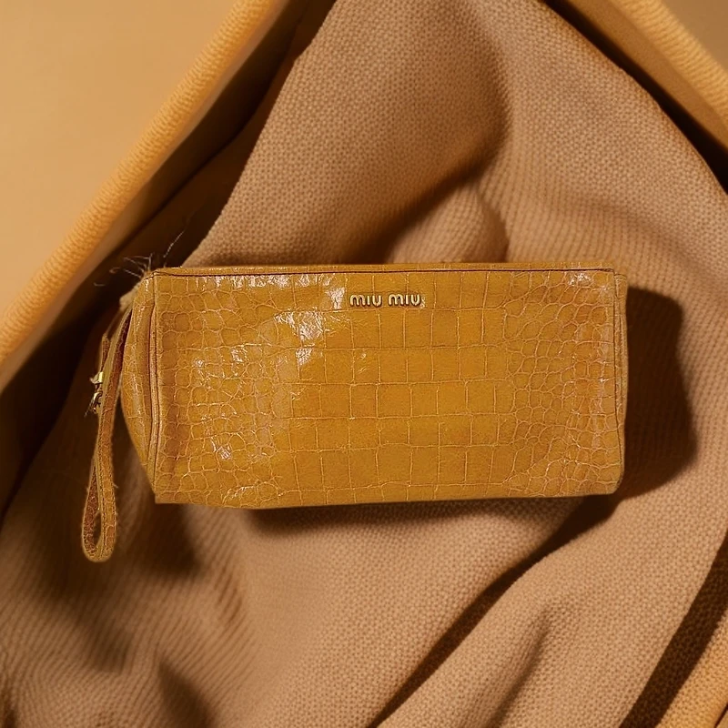 95新 MIU MIU/缪缪 黄色鳄压手拿包  1167 5233