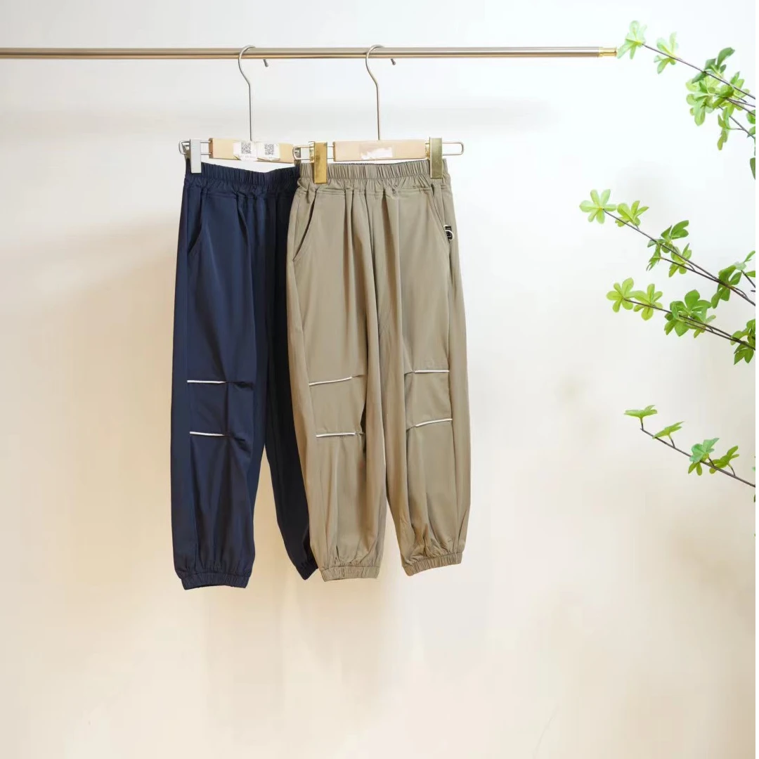 2-887一款两色儿童薄款休闲织带压褶裤（52620）