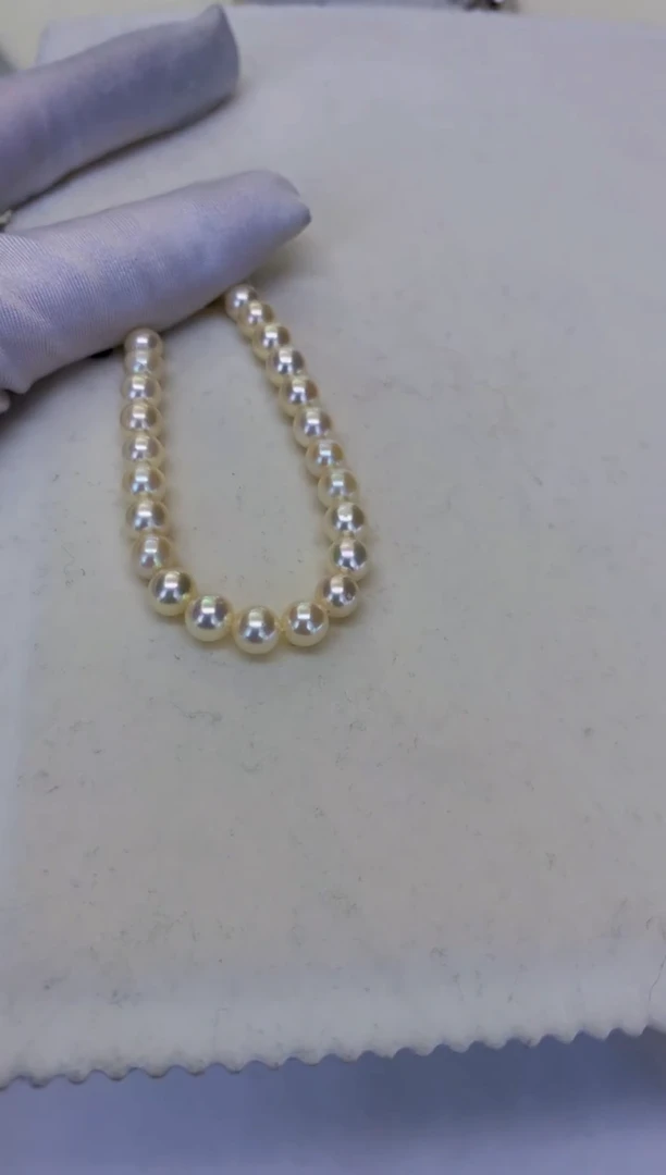 银S925镶嵌DA海水珍珠羽皇金手链  X156