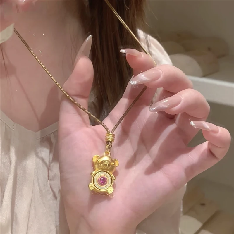 铜合金吊坠 可旋转抱抱熊项链女金色小熊抱花转圈圈编织绳毛衣链