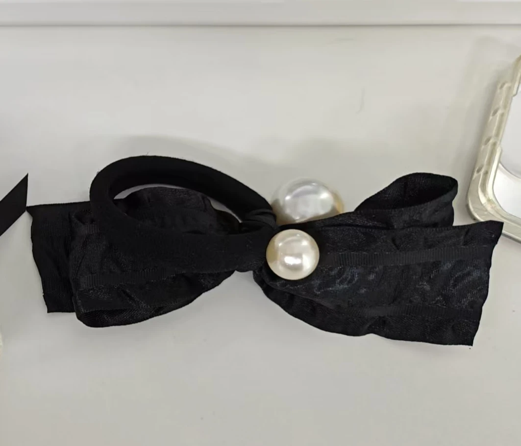 「蝴蝶珠珠」不理理夏季新款小众女装时尚休闲发圈