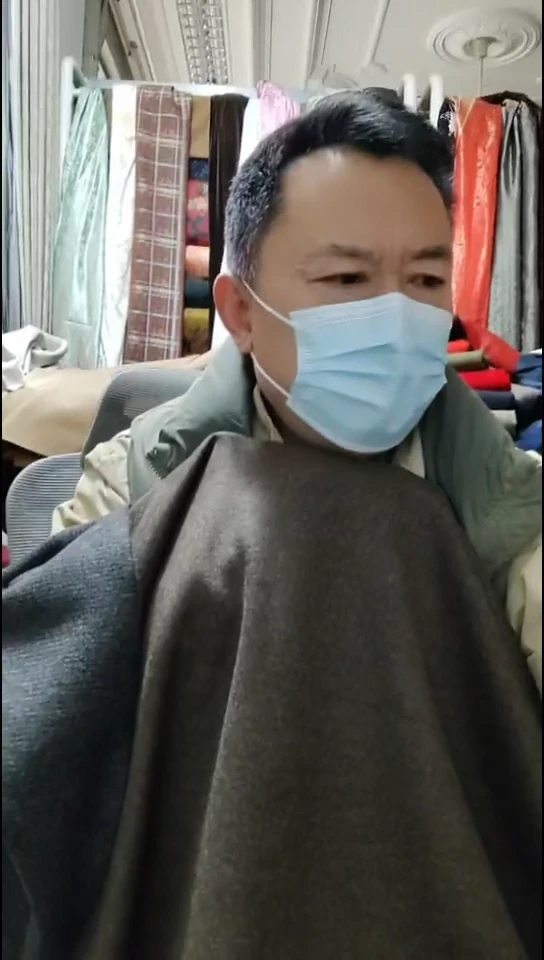 深咖色雪花针织布料