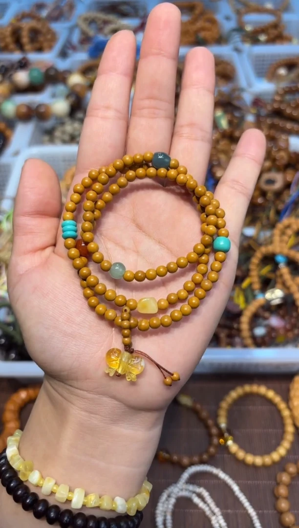 手串琥珀未镶嵌多圈橄榄核+蜜蜡蝴蝶