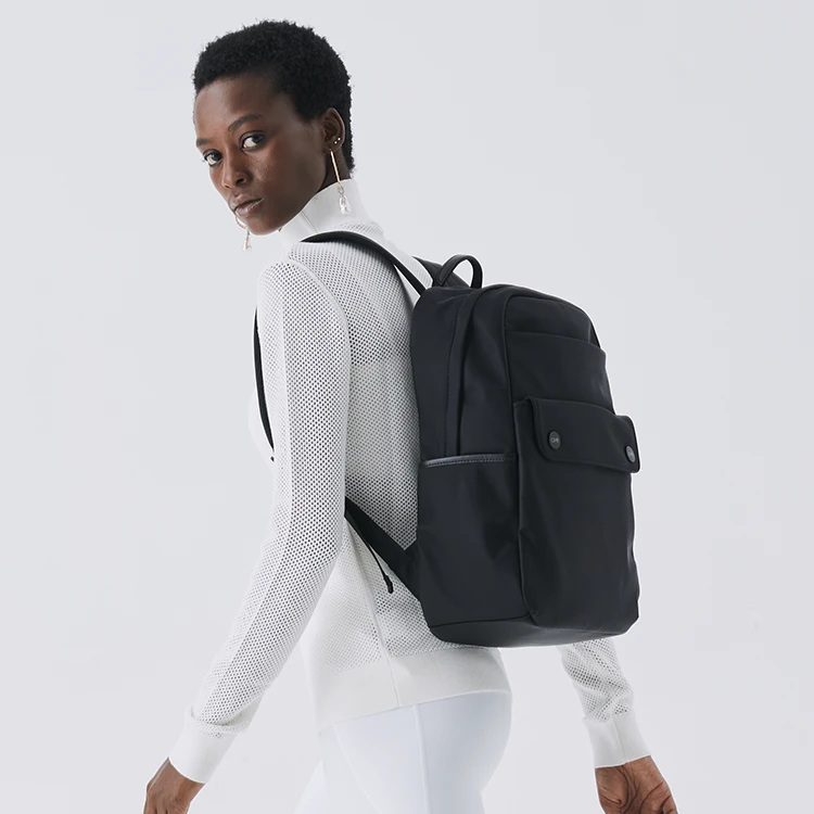 OMI/欧米简约百搭纯色系背包大容量轻便多用双肩包