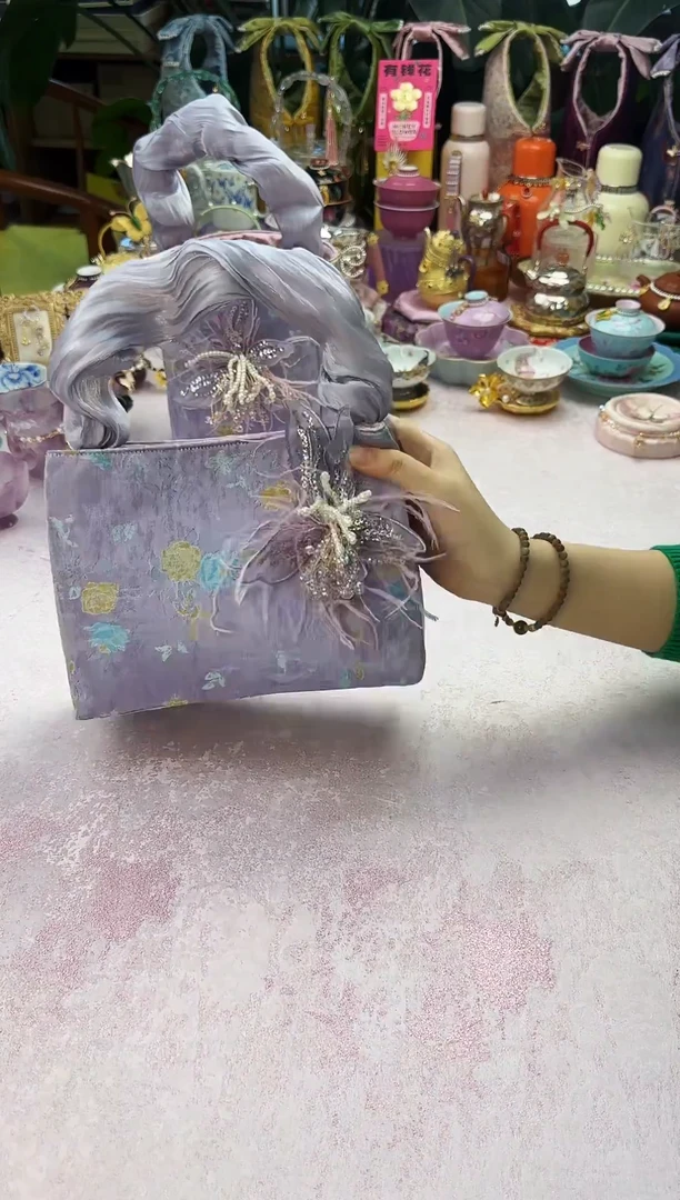 40 紫色小方手提包