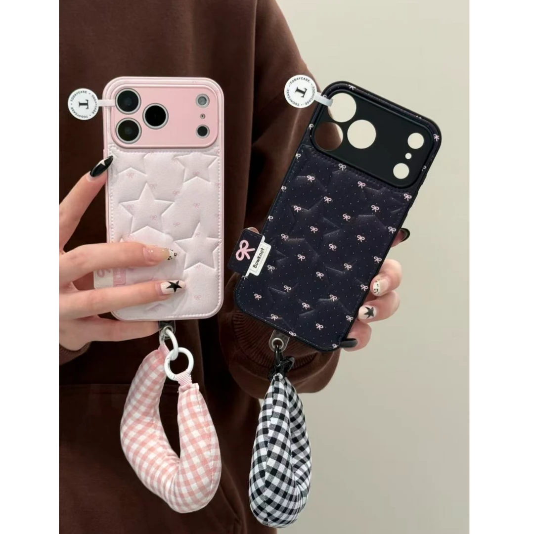 精孔蝴蝶结立体星星压纹手机壳适用苹果17promax防摔可爱腕带皮纹