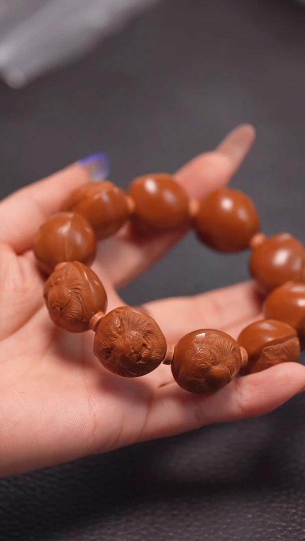 手串橄榄核2.1铁核单面虎头